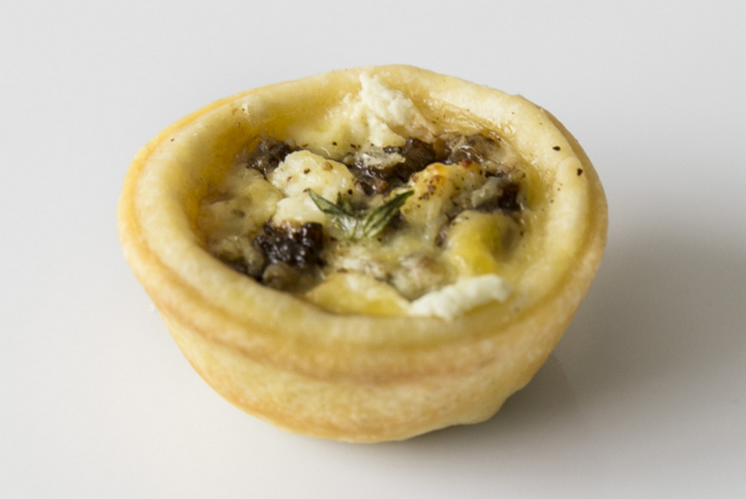 Caramelised onion, goats cheese & pear tartlets image 0
