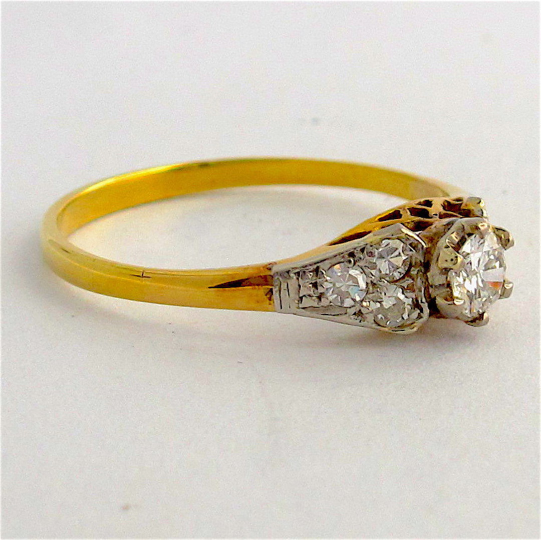 18ct yellow gold and platinum diamond solitaire ring with diamond set shoulders image 1