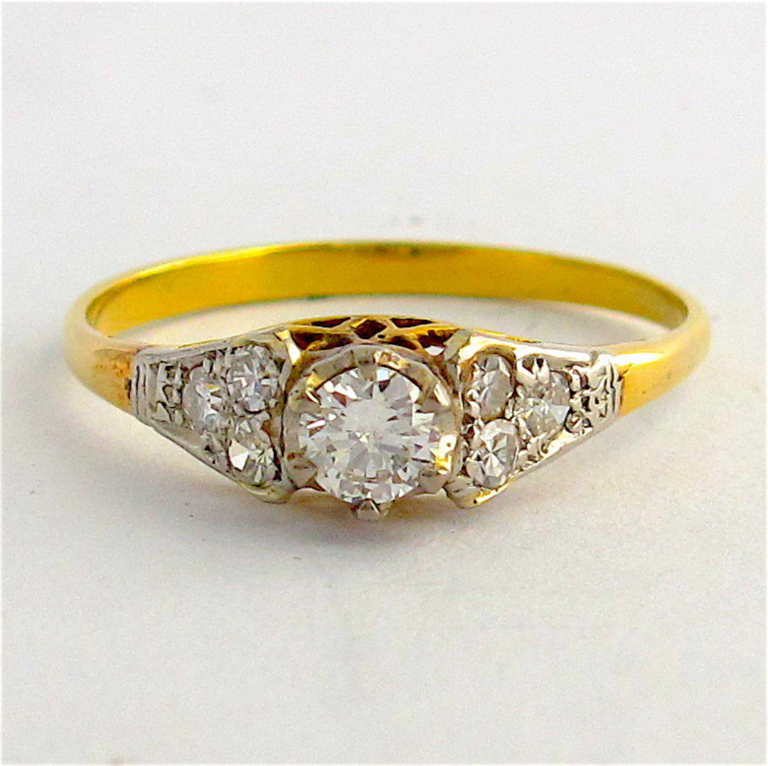18ct yellow gold and platinum diamond solitaire ring with diamond set shoulders image 0