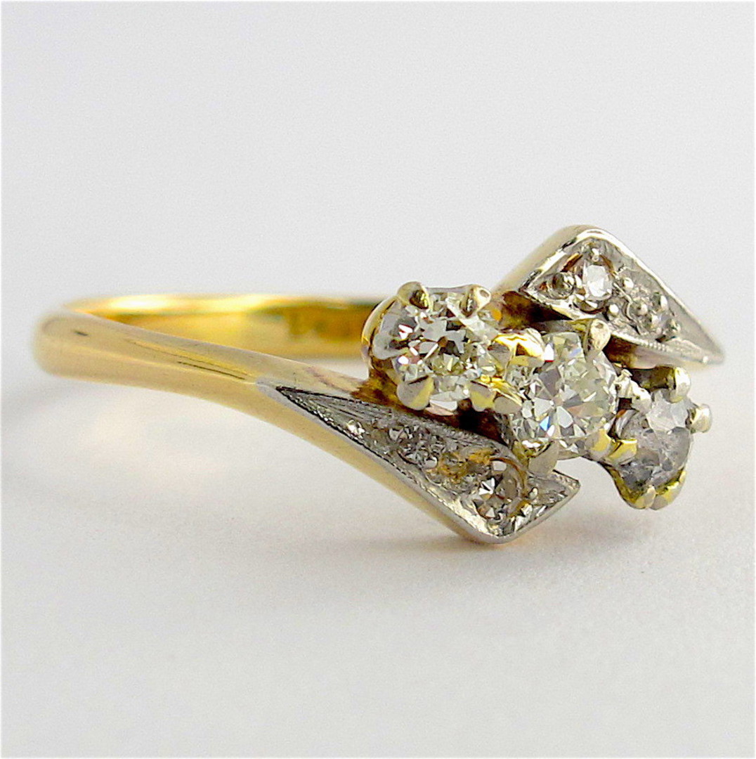 18ct yellow and white gold vintage three diamond set ring image 0