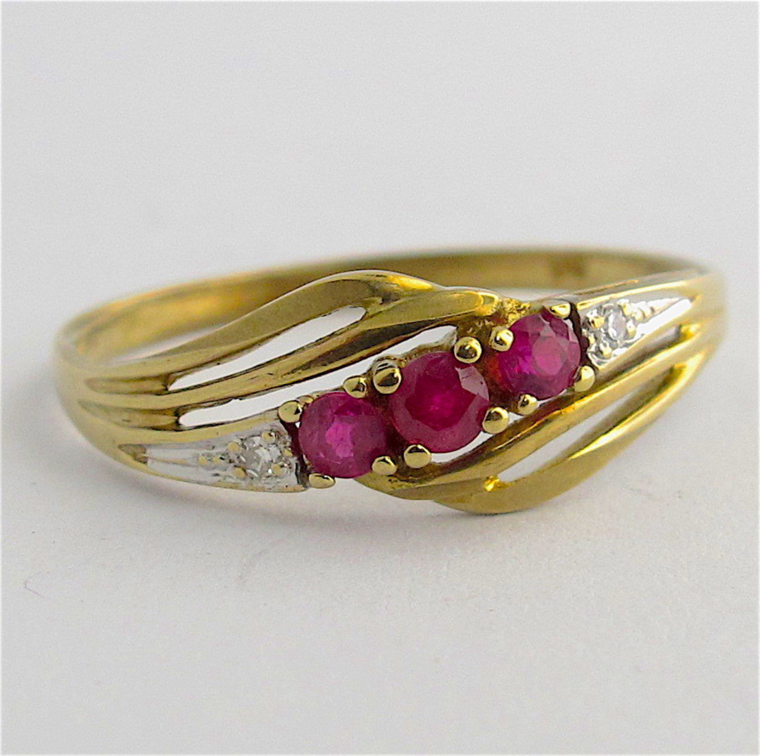 9ct yellow & white gold natural ruby and diamond set ring image 0