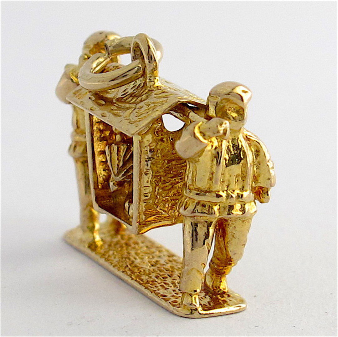 9ct yellow gold Chinese sedan chair with woman being carried charm image 1