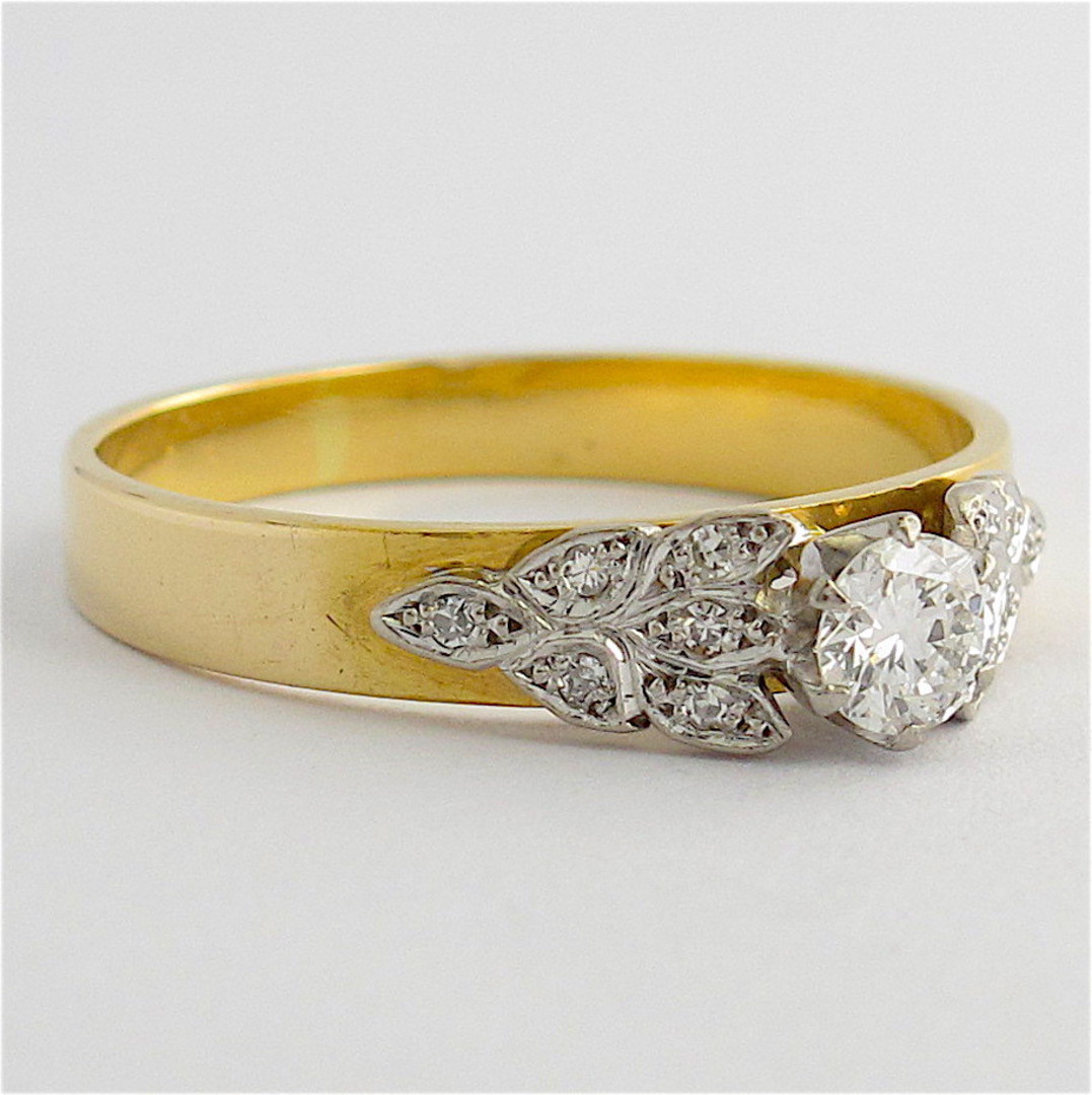 Vintage 18ct yellow and white gold diamond solitaire with fancy design image 1