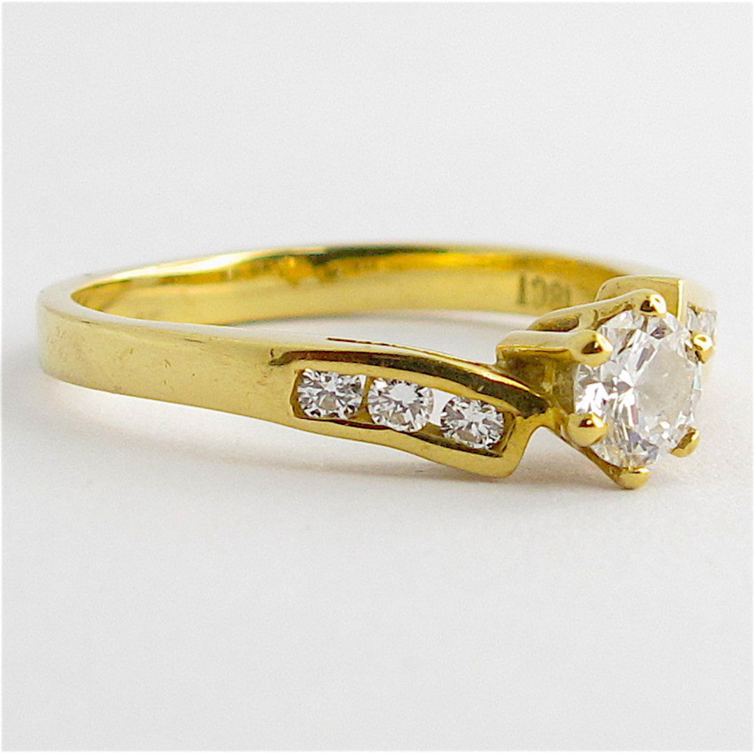 18ct yellow gold diamond solitaire with shoulder diamonds set ring image 1