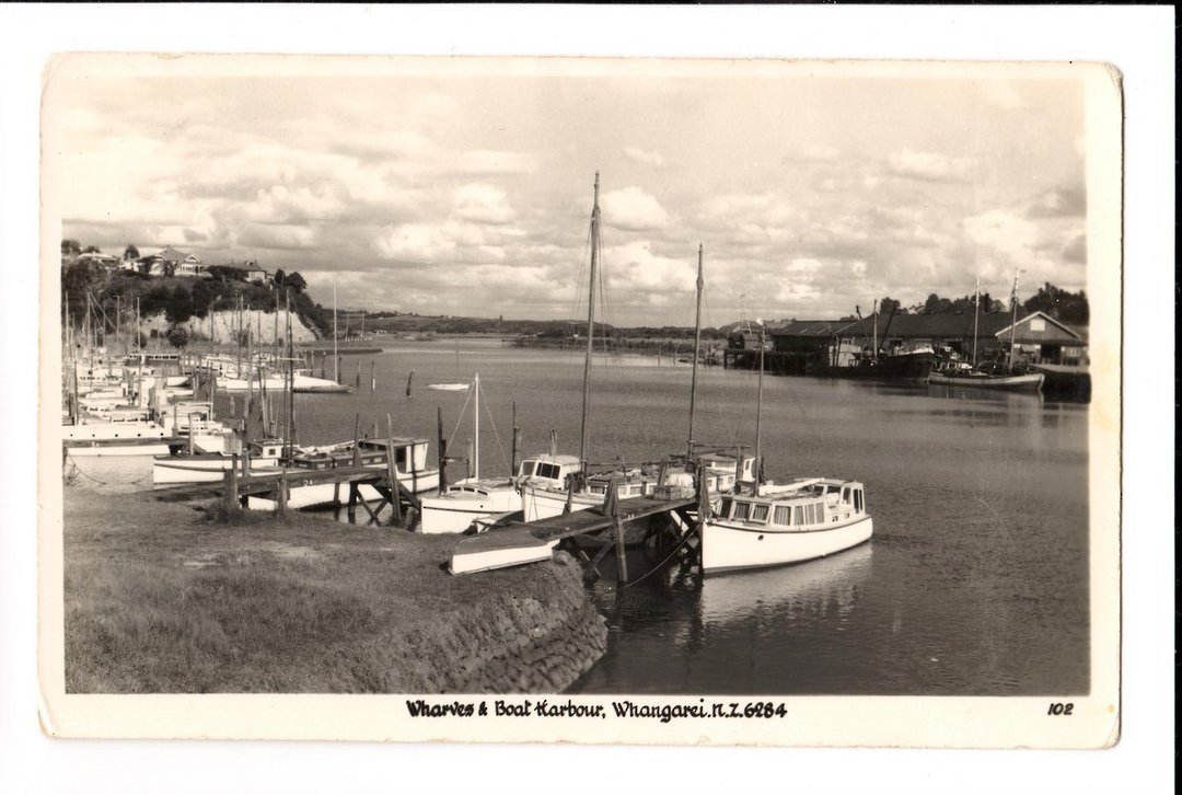Real Photograph by A B Hurst & Son of Wharves and Boat Harbour Whangarei. - 44872 - Postcard image 0