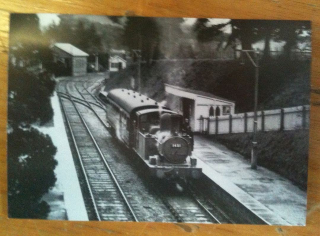 Postcard from Railway around Exmoor series. Reproductions of old Real Photographs. Western Region 1451 with a train for Dulverto image 0