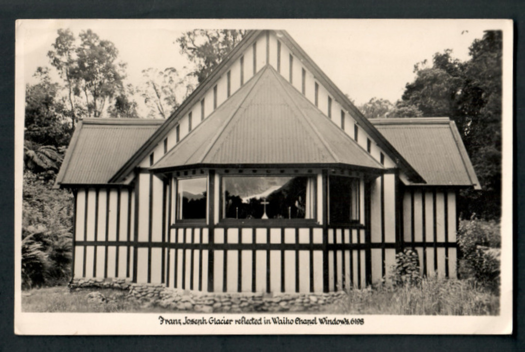 Real Photograph by A B Hurst & Son of Franz Josef Glacier reflected in the Waiho Chapel windows. - 248777 - Postcard image 0
