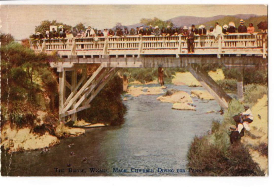 Coloured postcard of Th Bridge Whakarewarewa. Maori Children Diving for Pennies. - 45947 - Postcard image 0