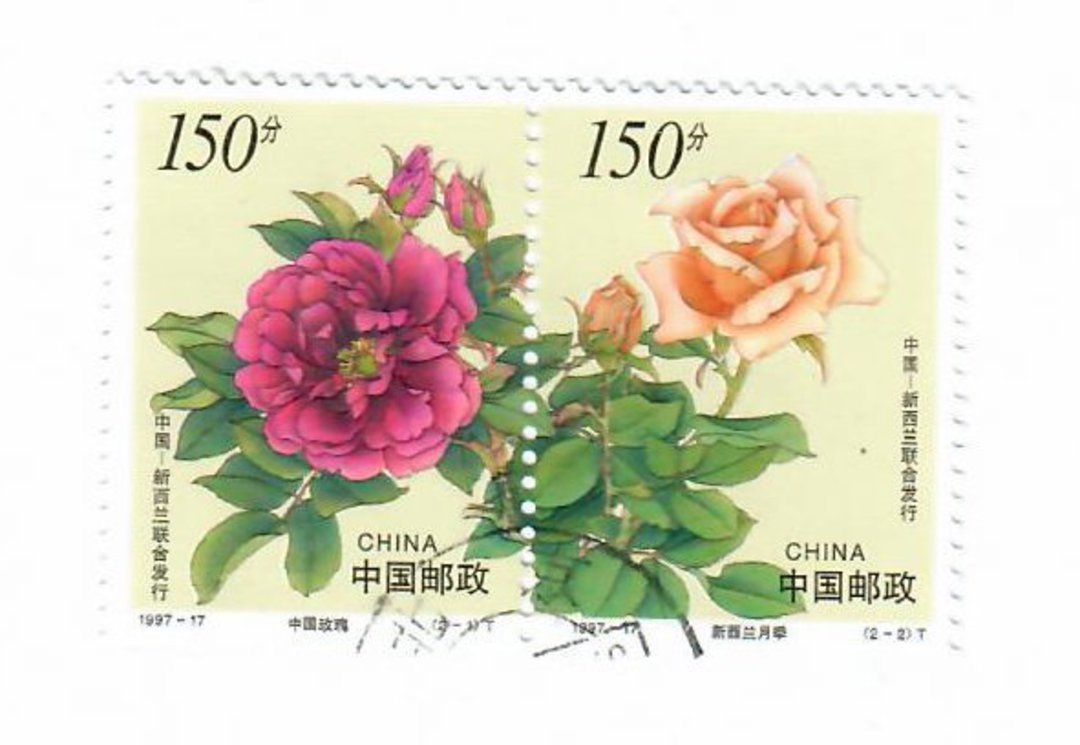 CHINA 1997 Roses. Joint issue with New Zealand. Joined pair. Not from the first day cover. - 39549 - VFU image 0