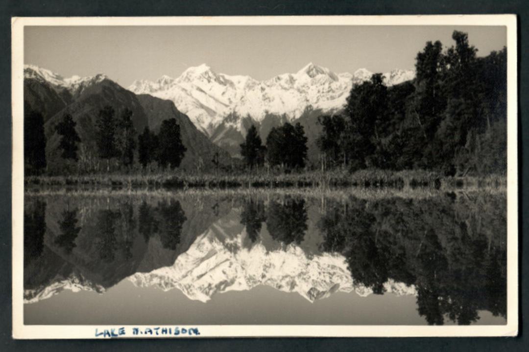 Real Photograph by N Hatwell Photographer of Fox Glacier of Lake Matheson. - 48761 - Postcard image 0