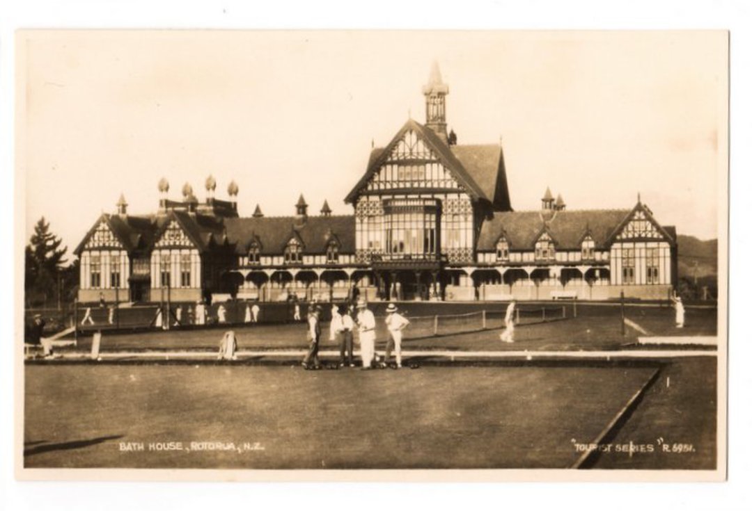Real Photograph by Frank Duncan of Bath House Rotorua including Bowling green. - 246073 - Postcard image 0