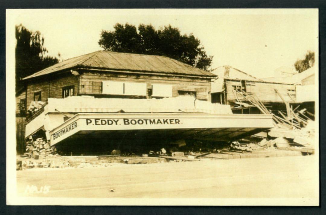 Photograph of wreckage of P Eddy Bootmaker. Napier Earthquake. - 47988 - Postcard image 0