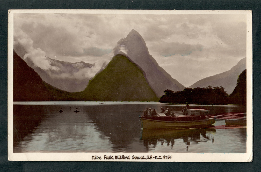 Real Photograph by A B Hurst & Son of Milford Sound. Tourist Launch in the foreground. - 49333 - Postcard image 0