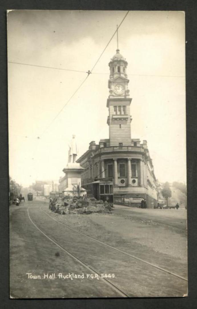Real Photo by Radcliffe of Town Hall, Auckland showing statue of Sir George Grey and Tram. - 45493 - Postcard image 0
