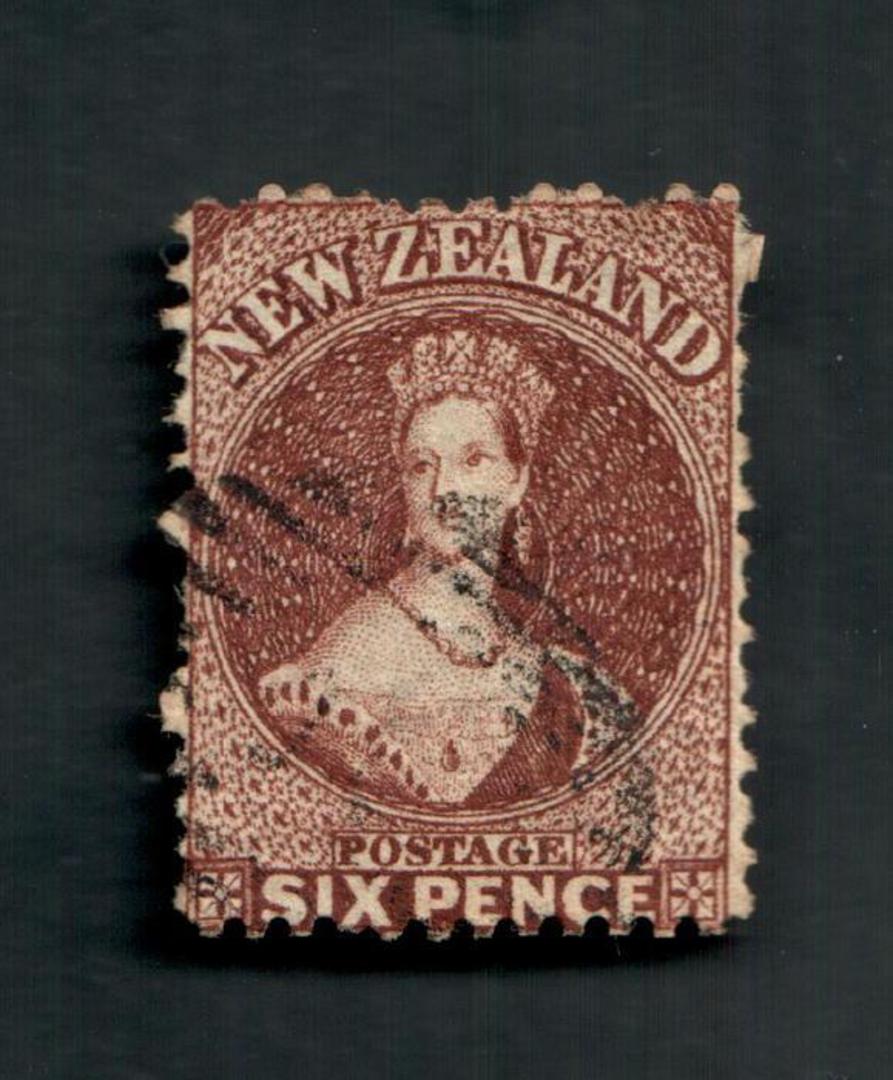 NEW ZEALAND 1862 Full Face Queen 6d Brown. Perf. No faults. Attractive postmark but does touch the face. A few damaged perfs. - image 0