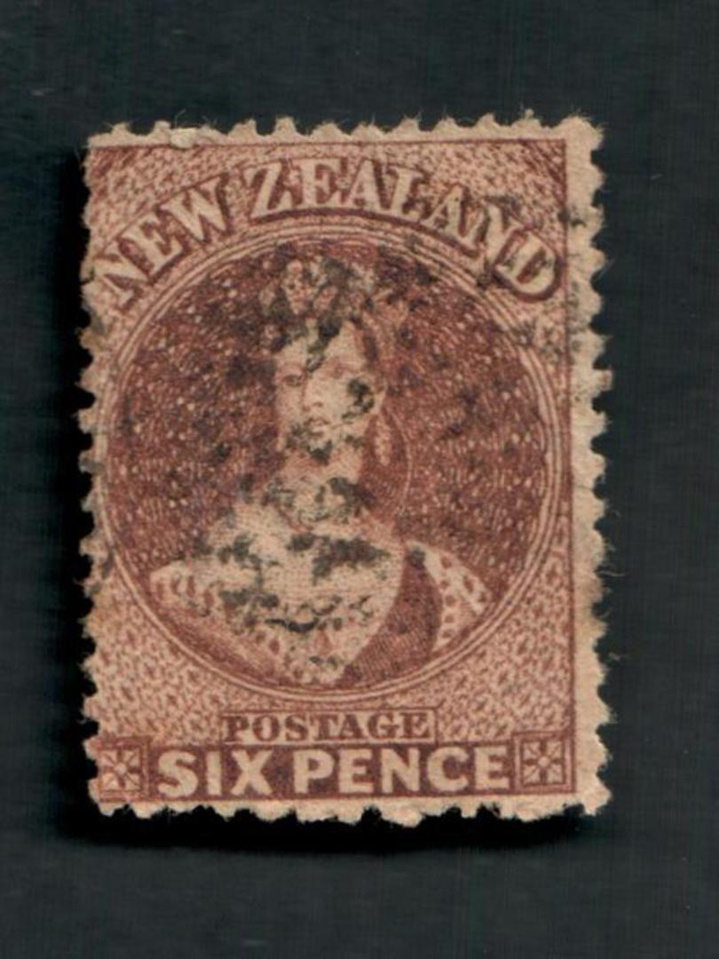 NEW ZEALAND 1862 Full Face Queen 6d Brown. Perf 12Â½. Watermark Large Star. Postmark light but interferes with the face. Small t image 0