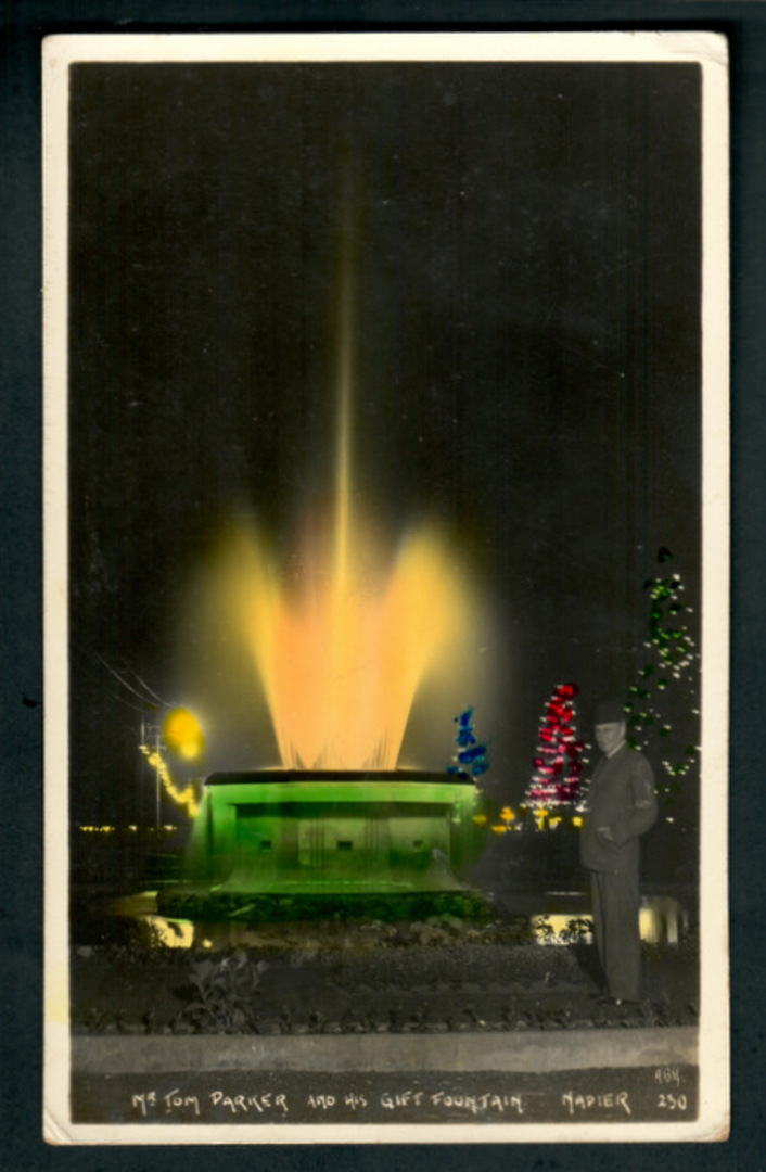 Coloured postcard of Tom Parker Fountain at night. - 48063 - Postcard image 0