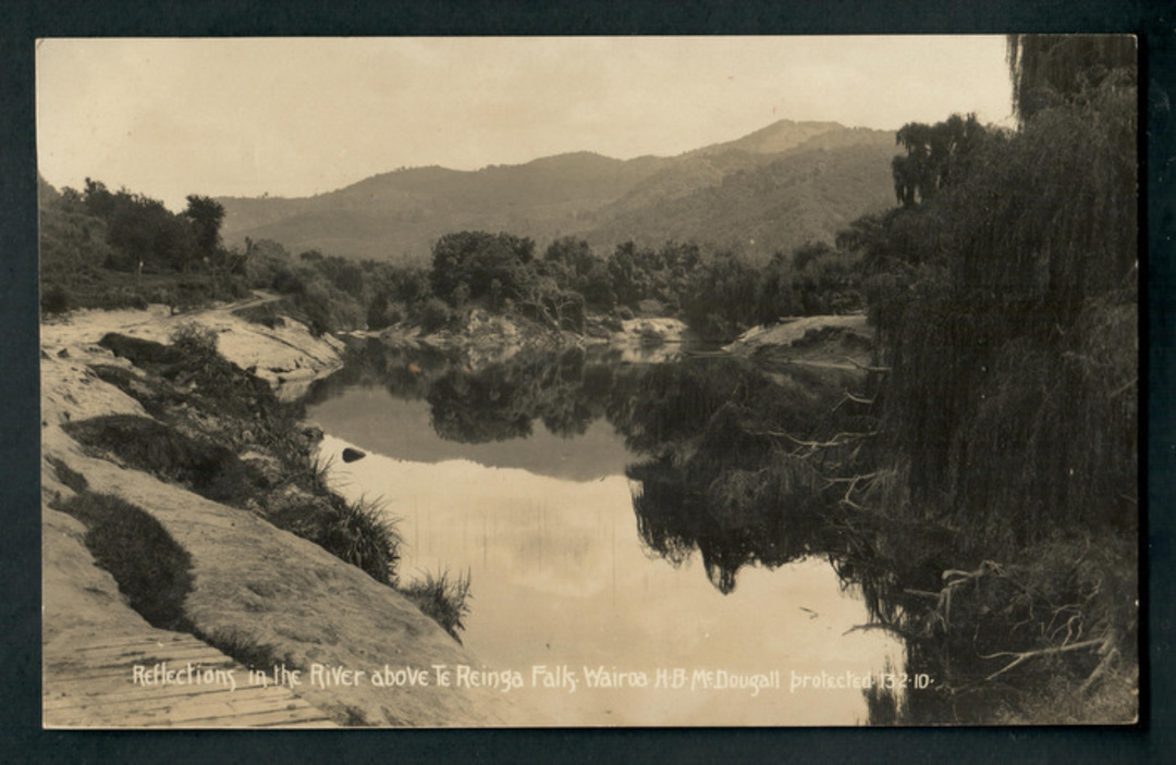 Real Photograph by McDougall 13/2/10. Reflections in the River above Te Reinga Falls Wairoa. Rare card. - 47910 - Postcard image 0