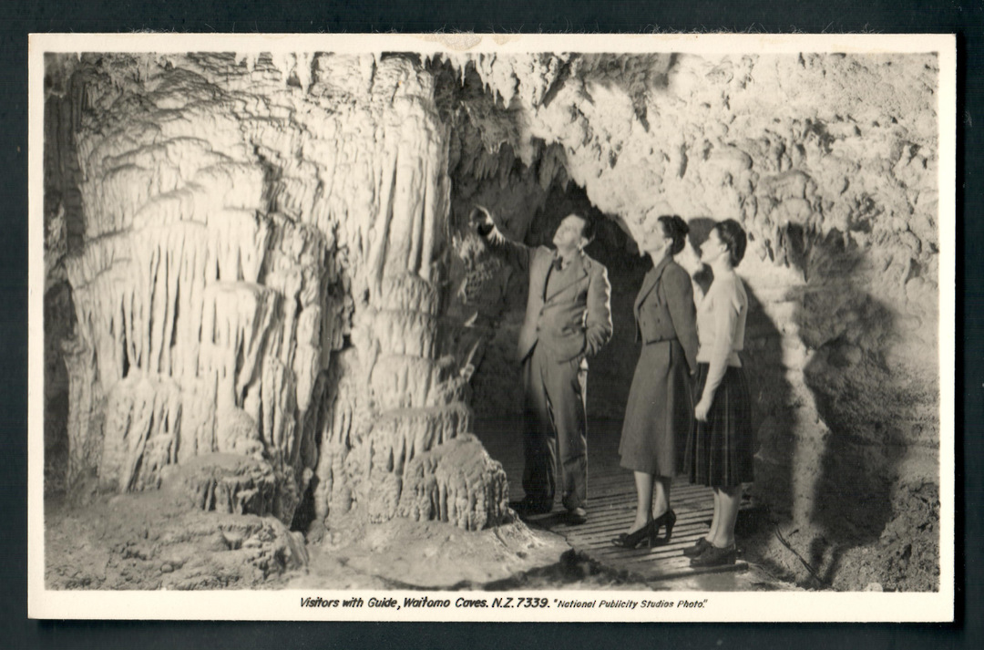 Real Photograph by of Visitors with Guide Waitomo Caves. Hurst type card. - 46408 - Postcard image 0
