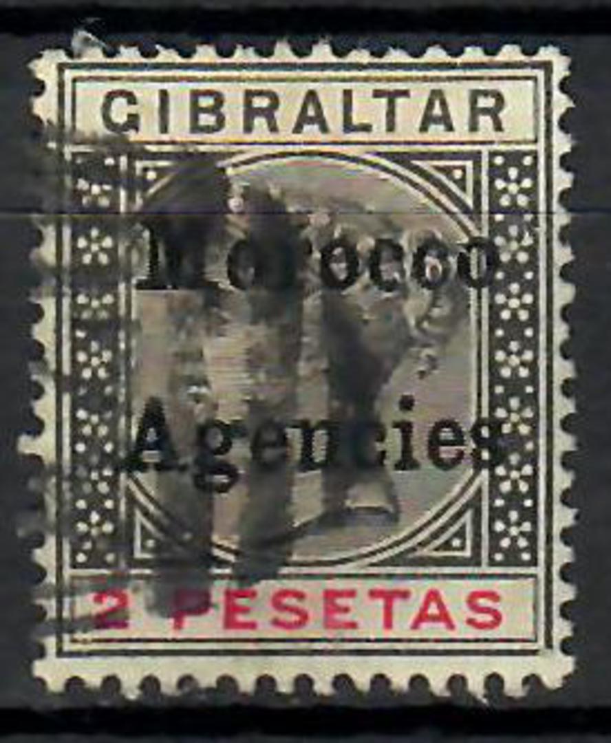MOROCCO AGENCIES 1899 2 pesatas. Overprint on Gibraltar.  Black & Carmine. Typical bars postmark. - 70953 - Used image 0