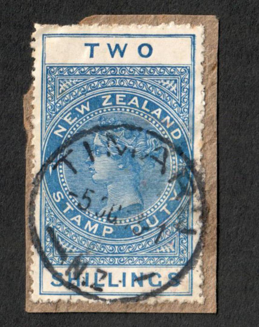 NEW ZEALAND 1882 Long Type Postal Fiscal 2/- Blue. On piece with genuine cancel. - 39270 - FU image 0