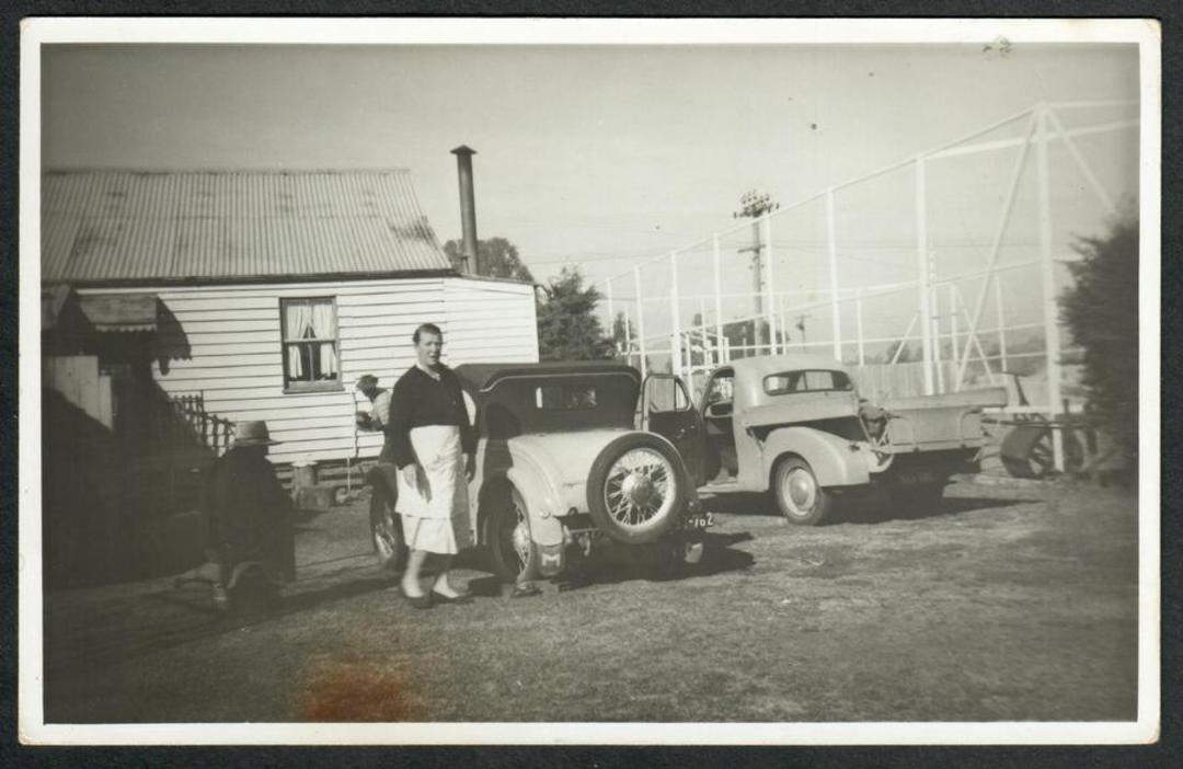 NEW ZEALAND Backyard Scene. Old truck and an absolutely delightful car. - 749782 - Postcard image 0