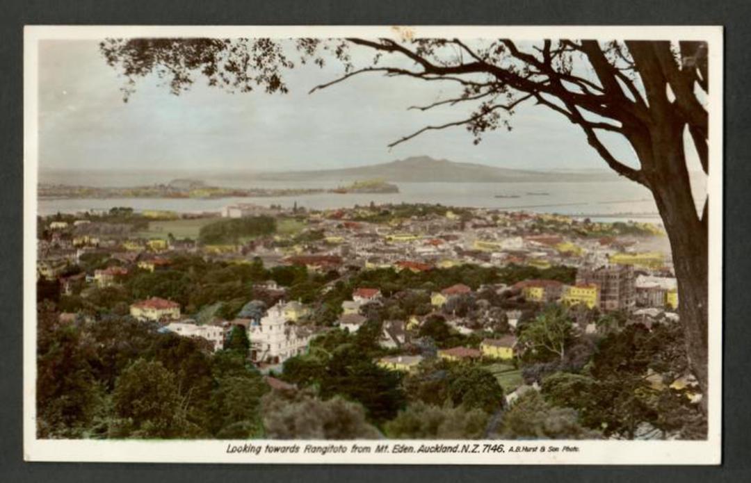 Coloured Real Photograph by A B Hurst & Son. Looking towards Rangitoto from Mt Eden. - 45486 - Postcard image 0