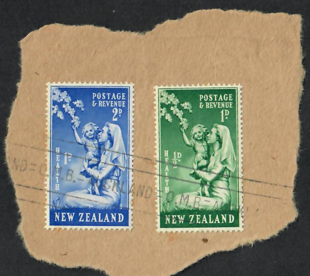 NEW ZEALAND Postmark Auckland Roller Cancel Auckland OMB on pair of 1949 Health on piece. - 21881 - Postmark image 0
