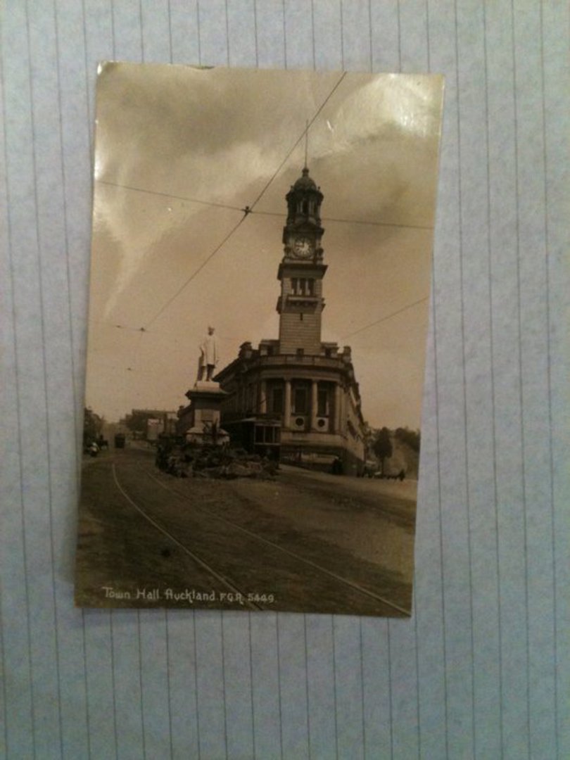 Real Photo by Radcliffe of Town Hall, Auckland showing statue of Sir George Grey and Tram. - 45410 - Postcard image 0