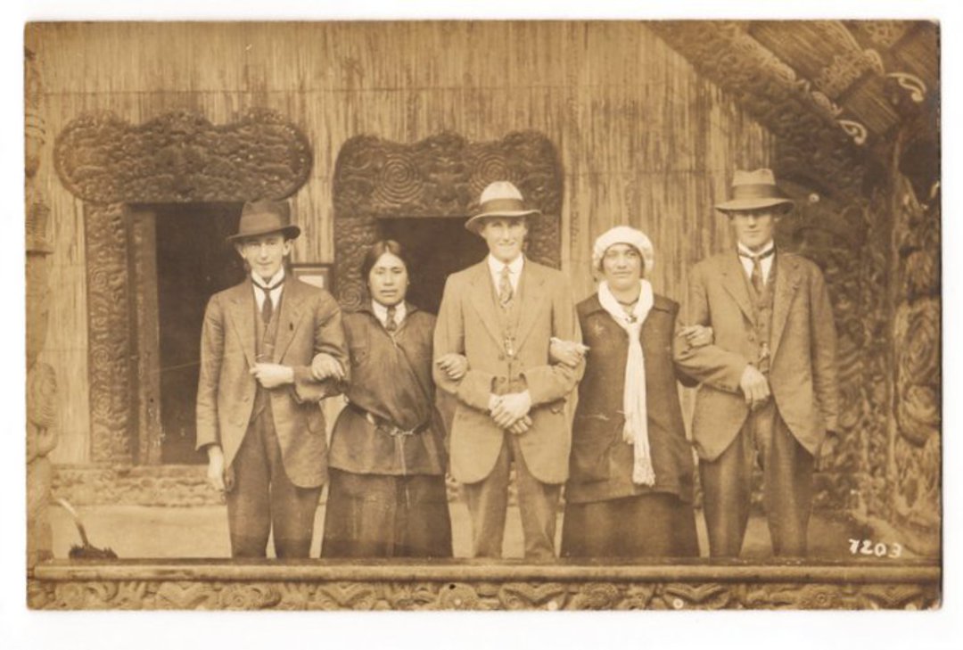 Real Photograph of three tourist and two guides in front of a meeting house. - 69672 - Postcard image 0
