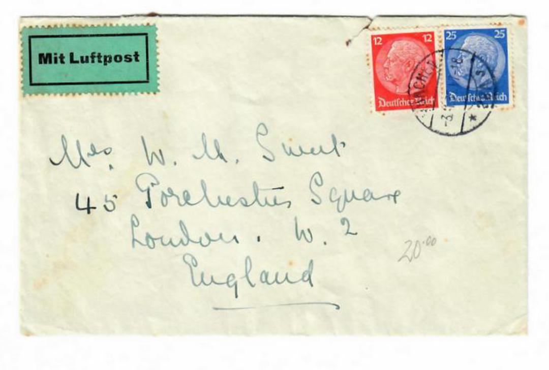 GERMANY 1935 Cover to Great Britain. Label MIT LUFTPOST. Postmark MUNCHEN 3/11/35. Torn on the reverse. Toned around the stamps. image 0