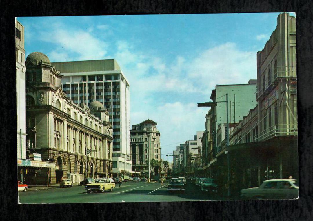 Modern Coloured Postcard by Gladys Goodall of South Pacific Hotel and Queen St Auckland. - 444592 - Postcard image 0