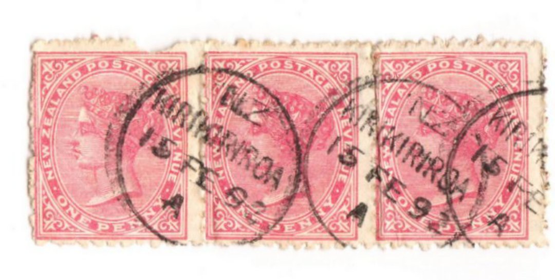 NEW ZEALAND Postmark Hamilton KIRIKIRIROA. A Class cancel on strip of 3 1d Second Sideface. Two complete strikes but one fault. image 0