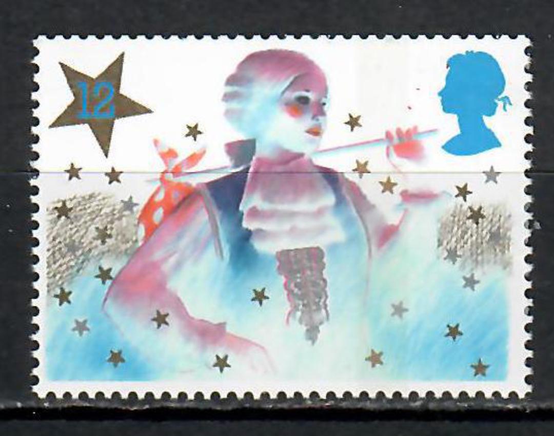GREAT BRITAIN 1985 Christmas 12p from the £2.40 Discount Stamp Booklet. Shows a blue underprint of a double lined star on the re image 0