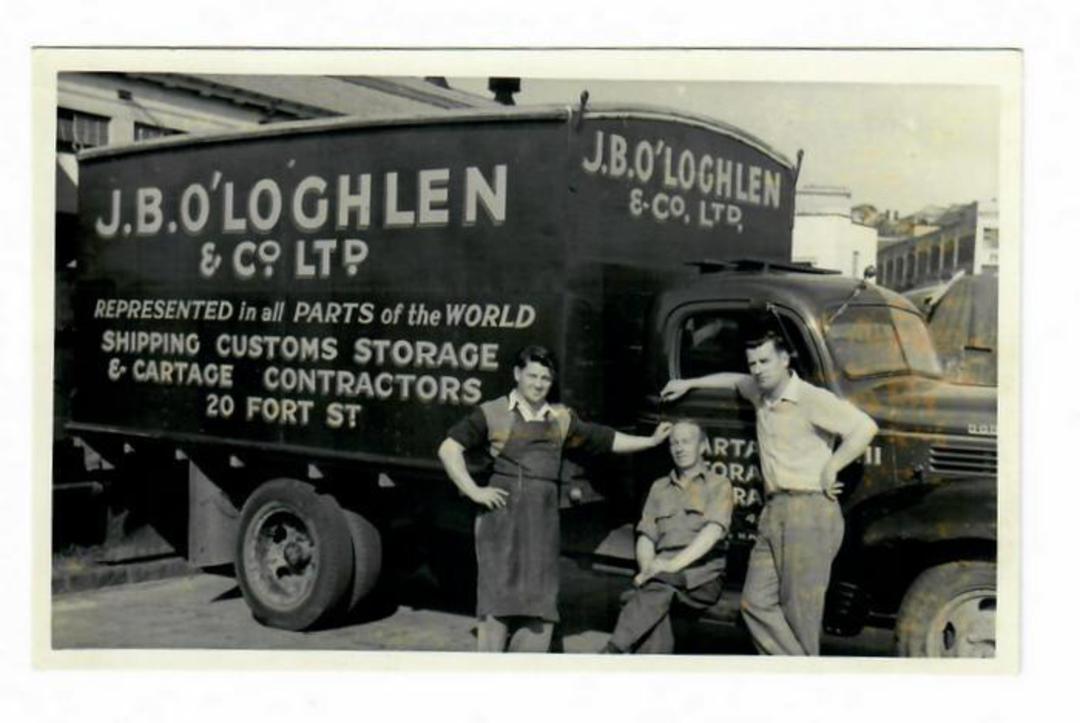 NEW ZEALAND Photograph of Truck and drivers of the firm J B O'Loghlen & Co Ltd. White border. Used as a postcard during the sale image 0