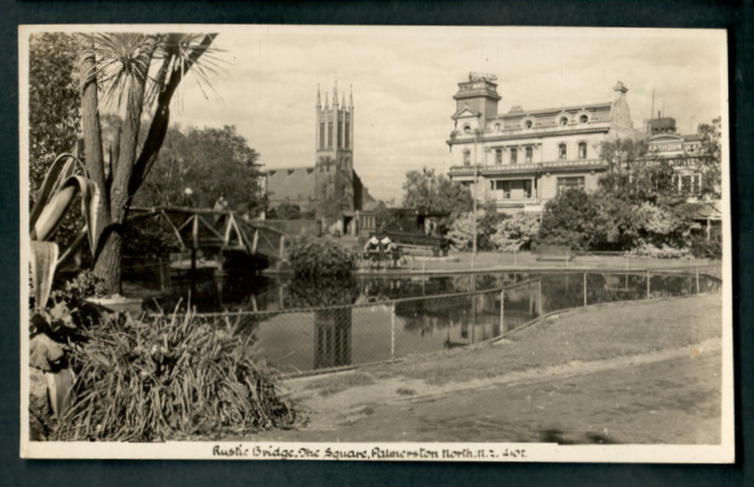Real Photograph by A B Hurst & Son of Rustic Bridge Square Palmerston North. - 47239 - Postcard image 0