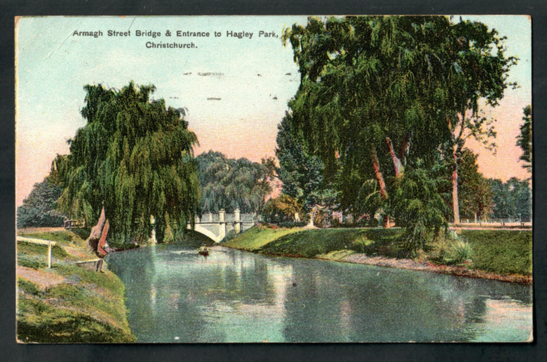 Coloured postcard of Armagh Street Bridge and Entrancc to Hagley Park Christchurch. - 48336 - Postcard image 0