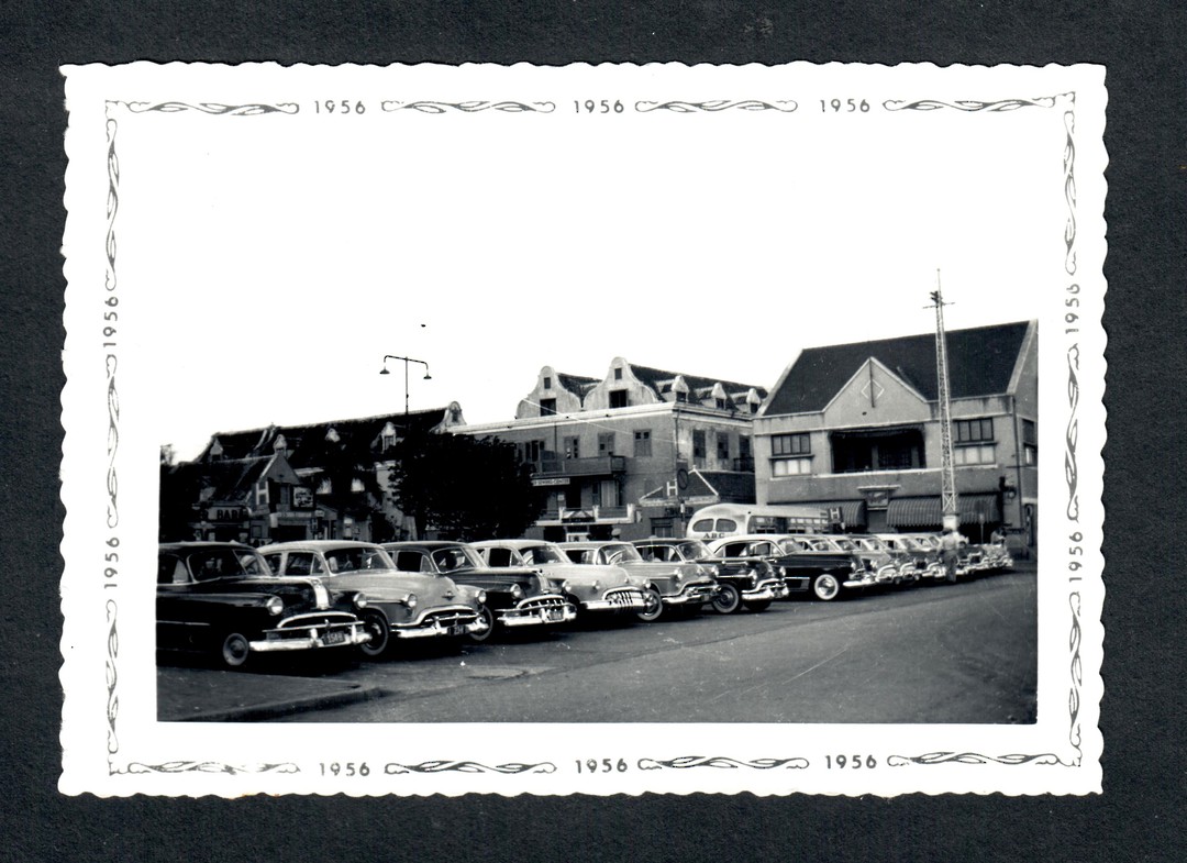 Photograph 1956 of a line-up of superb cars. Probably taken in USA or Panama City. A car enthusiast will kill for this card. - 4 image 0