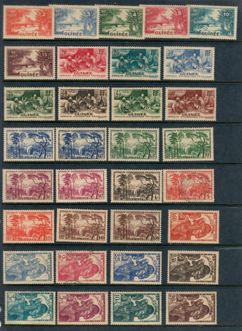 FRENCH GUINEA 1938 Definitives. Set of 33. Mostly in fine mint condition with gum removed as is common. Two of the values are ni image 0