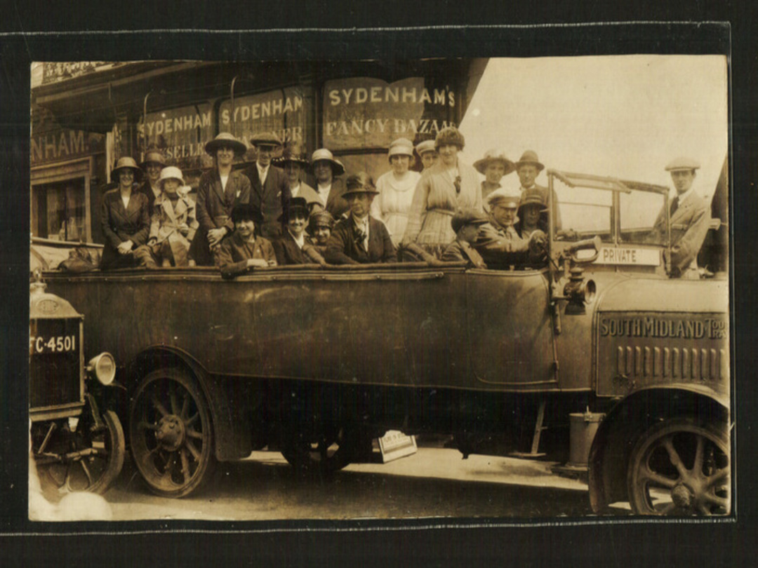 Real Photograph of of an early topless bus on a trip to Bournmouth. Sydenham shops behind. In a pile of cards addressed to Burne image 0
