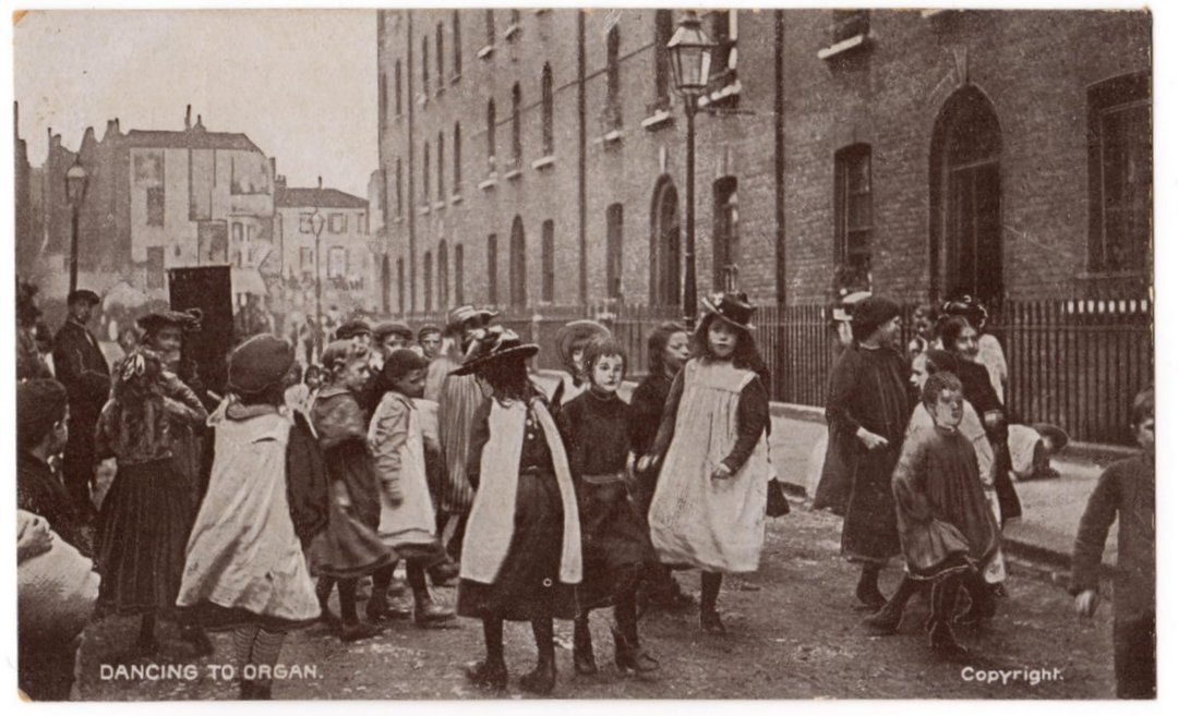 Two postcards. Dancing to Organ. Pick a back fight. Social history of London. - 44728 - Postcard image 0