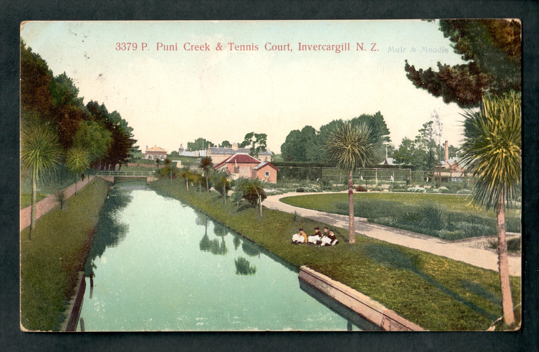 Coloured postcard by Muir and Moodie of Puni Creek and Tennis Court Invercargill. - 49394 - Postcard image 0
