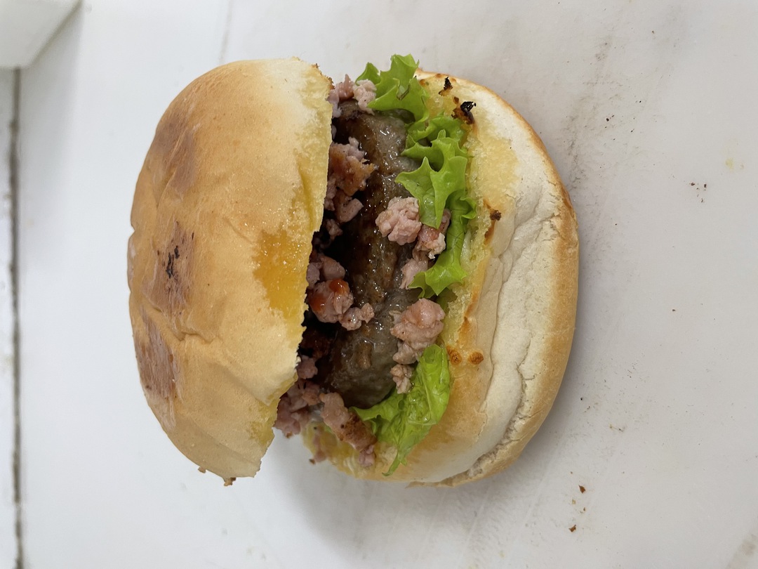 BACON BURGER - cubed bacon bits, beef patty, melted cheese & lettuce image 0
