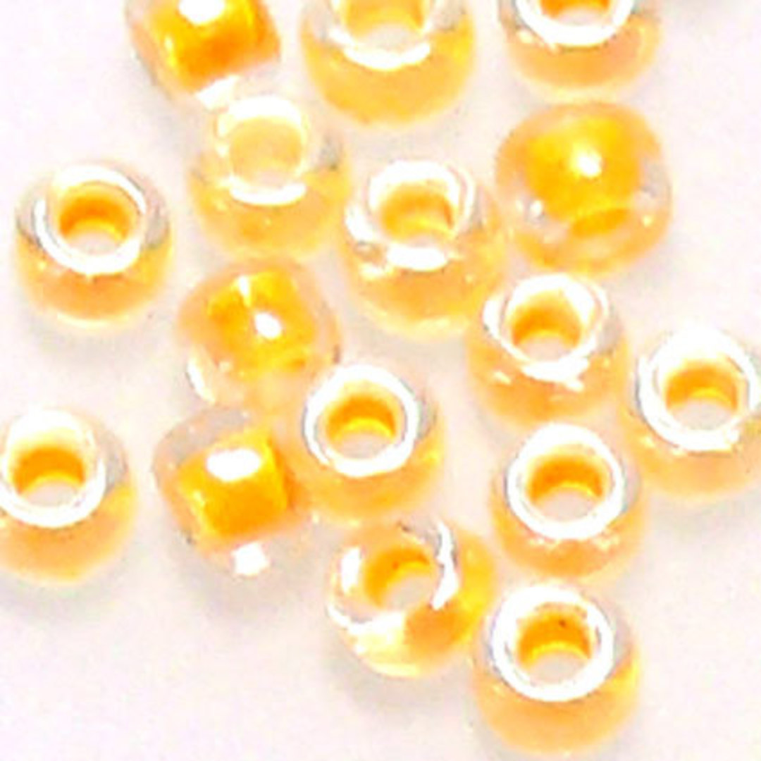 Matsuno size 11 round: 202A - Apricot/Clear, colour lined (7 grams) image 0