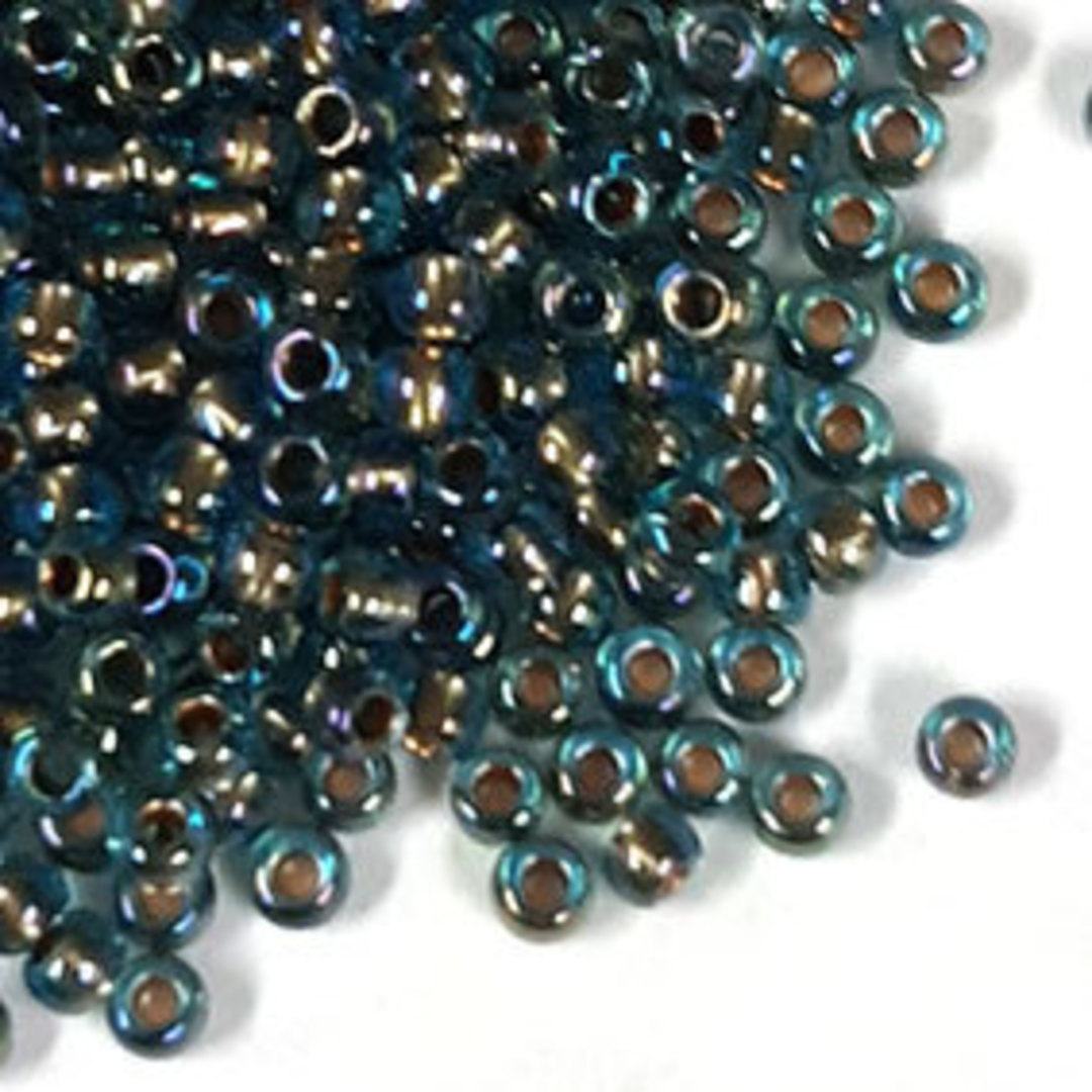 Toho size 11 round: 378F - Deep Indicolite sheen, gold colour lined (7 grams) image 0