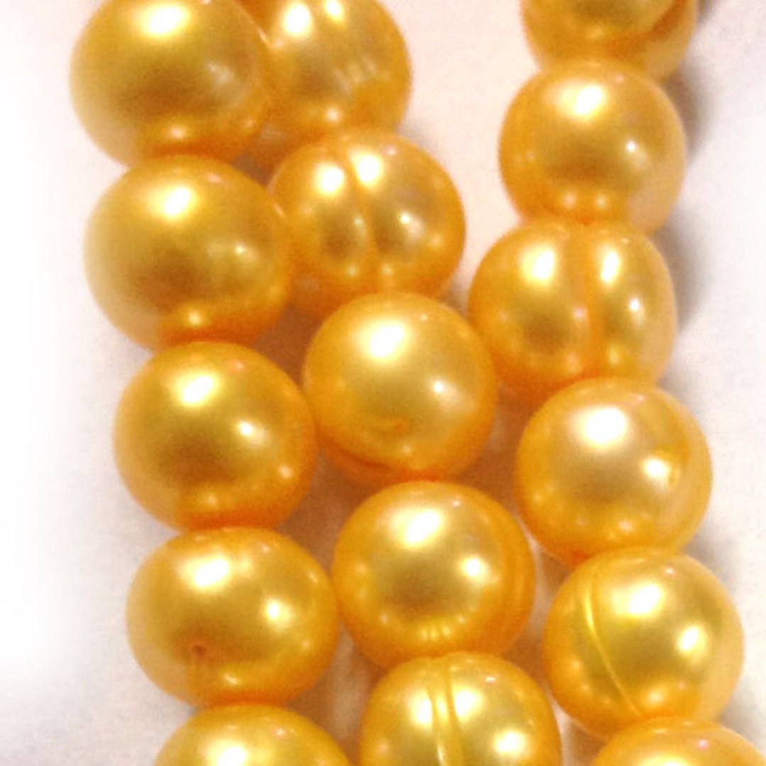 40cm Freshwater Pearl Strand: Golden Yellow ringed rounds, 8mm image 0