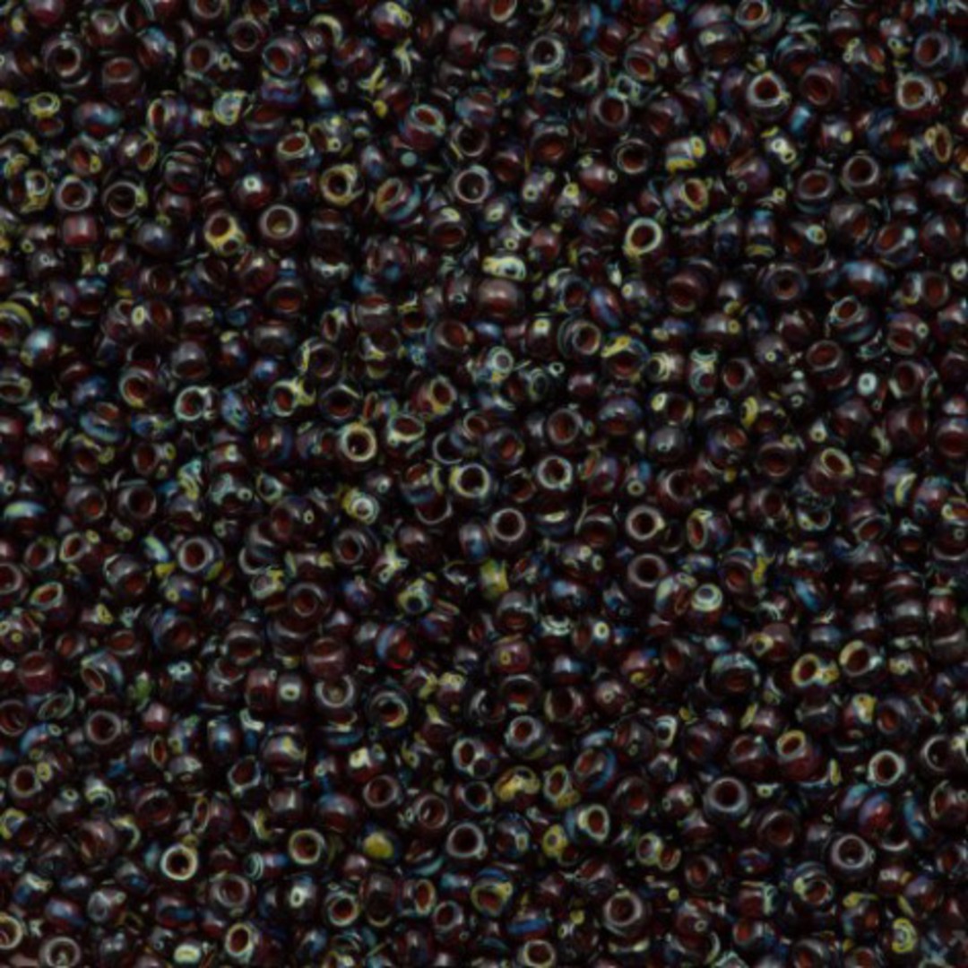 Miyuki size 11 round, 4504: Transparent Dark Garnet Picasso (7 grams) image 0