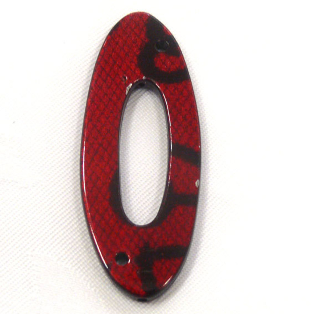 Acrylic Donut Style Piece, red oval, snake like markings image 0