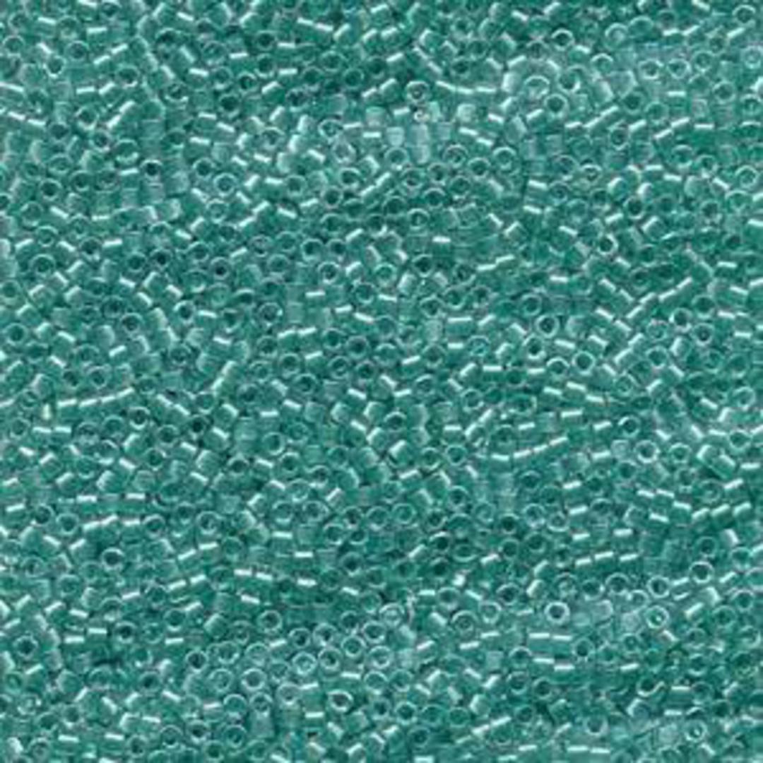 11/0 Miyuki Delica, colour 904 - Sparkling Turquoise lined Crystal image 1