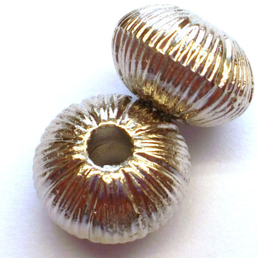 Metal bead, 8x12mm: Fat ridged rhondelle image 0